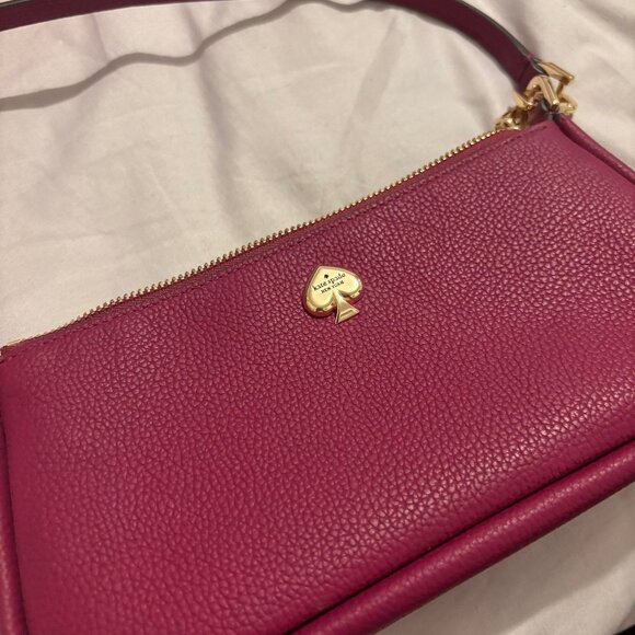 kate spade Handbags - Kate Spade burgundy Kayla convertible wristlet